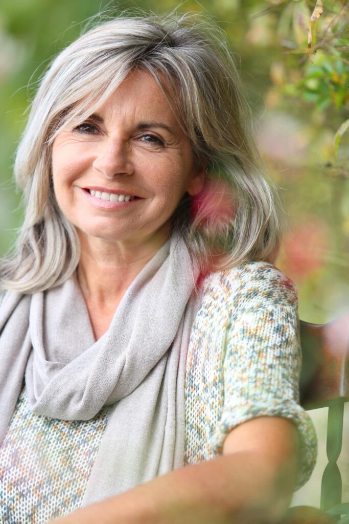 Portrait of serene mature woman in garden Portrait of serene mature woman in garden